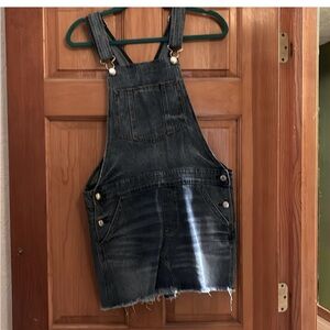 American eagle dark blue denim overall dress/skirt size medium.Fits bigger bust